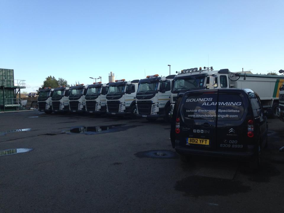 Sounds Alarming mobile van in front of a fleet of lorries which work has been carried out on